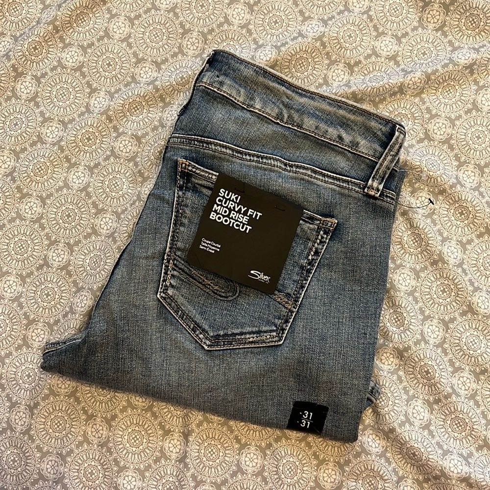 Silver Suki Mid Rise Bootcut- New with tags